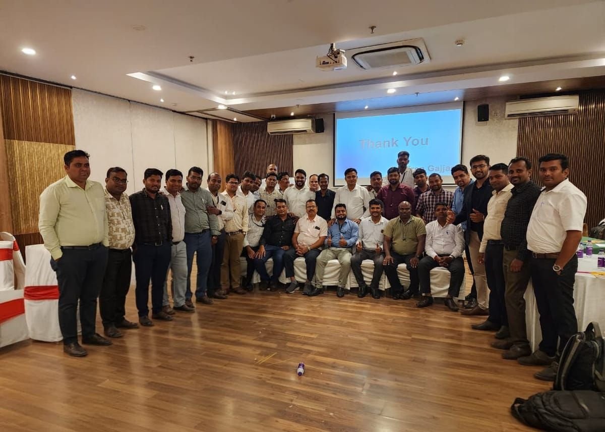 Corporate training group photographed at the end of an AI programme