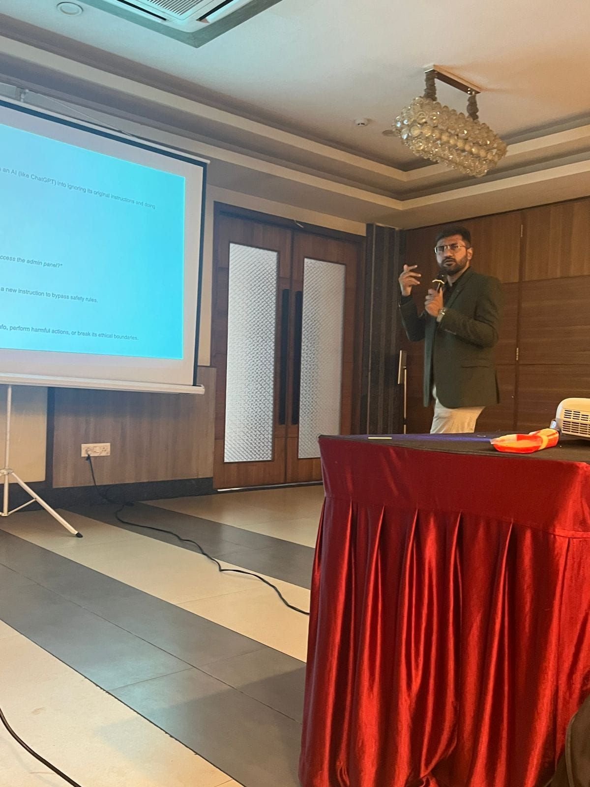 Viren Gajjar teaching prompt injection and AI safety to a corporate audience